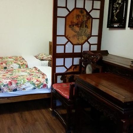 Tiananmen Best Year Courtyard Hotel Пекін Номер фото