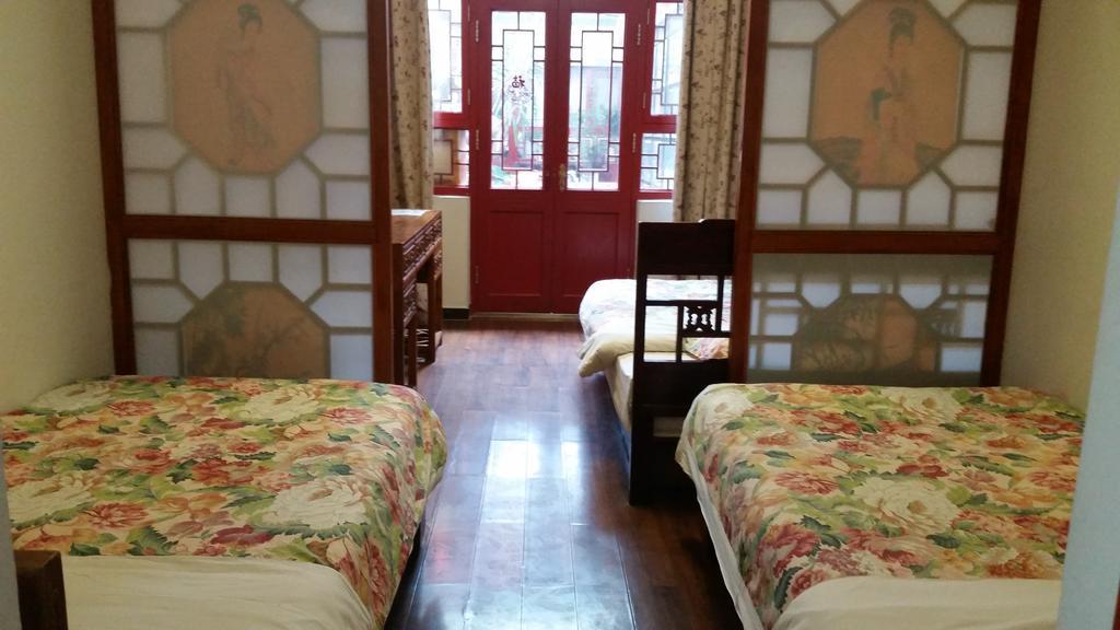 Tiananmen Best Year Courtyard Hotel Пекін Номер фото