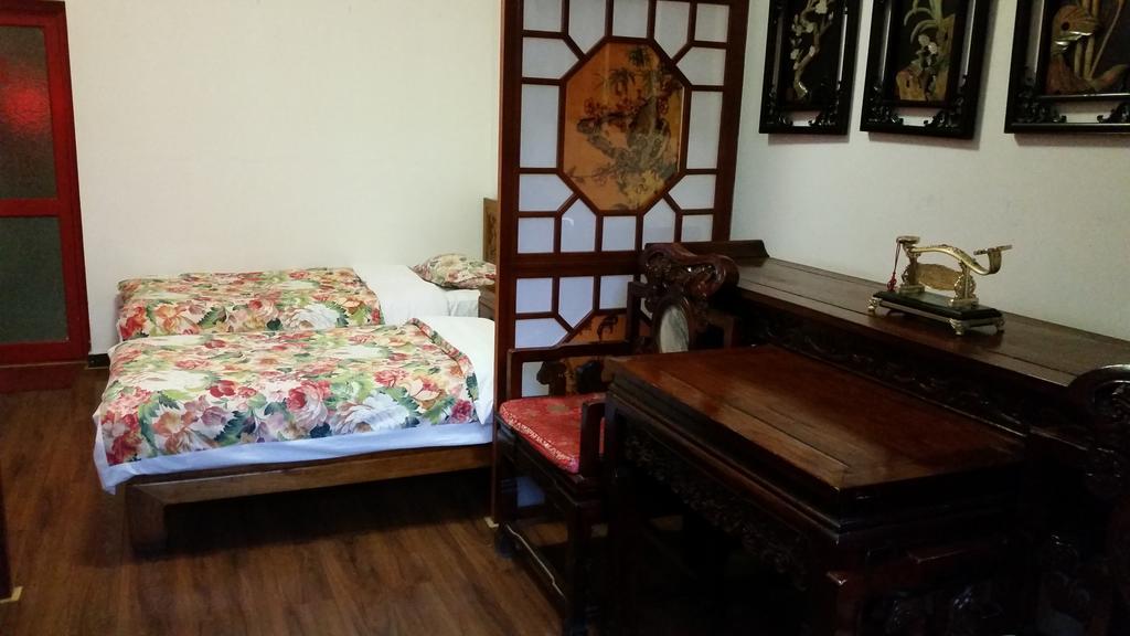 Tiananmen Best Year Courtyard Hotel Пекін Номер фото